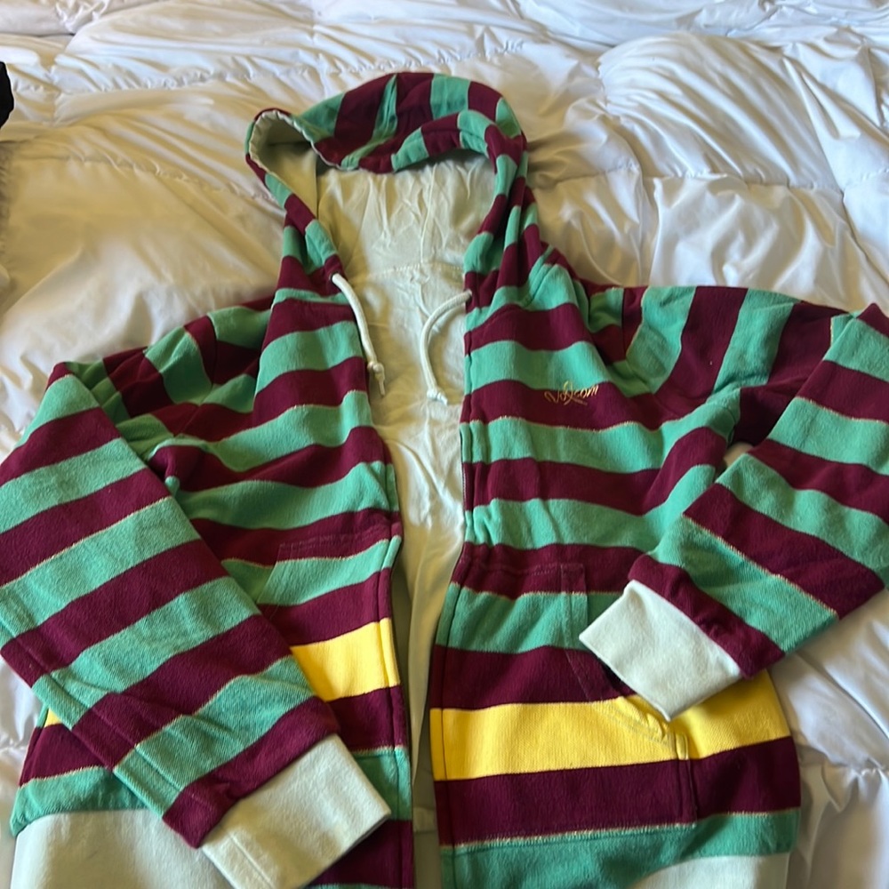 It’s a volcom hoodie from the early 2000’s reversible.